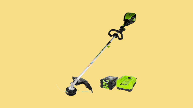A Greenworks trimmer set against a light yellow background.