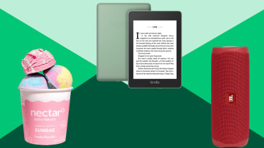 bath bombs, e-reader and red portable speaker on a green background