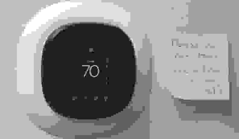 Smart thermostat with a sassy note next to it