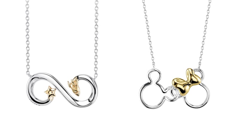 two silver/gold necklaces on white background