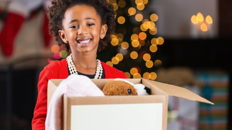 Kids can fill a bag or box with clothes and toys they've outgrown.