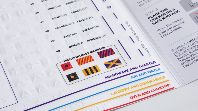 Pageds of the GE Access Kit binder, showing braille labels and high contrast markers for oven functions