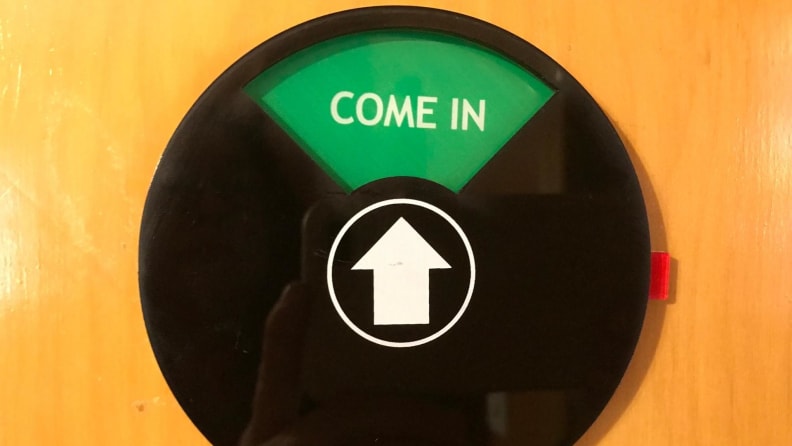 The Privacy Sign set to the green setting, "come in."