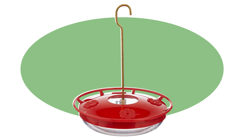 Product shot of the circular, red Aspects HummZinger HighView 12 Oz Hanging Hummingbird Feeder.