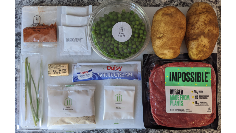 Ingredients for pot roast including Impossible Burger, peas, and potatoes
