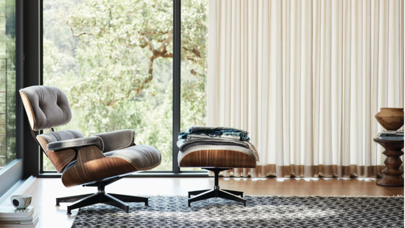 An Eames Chair replica staged in a room.