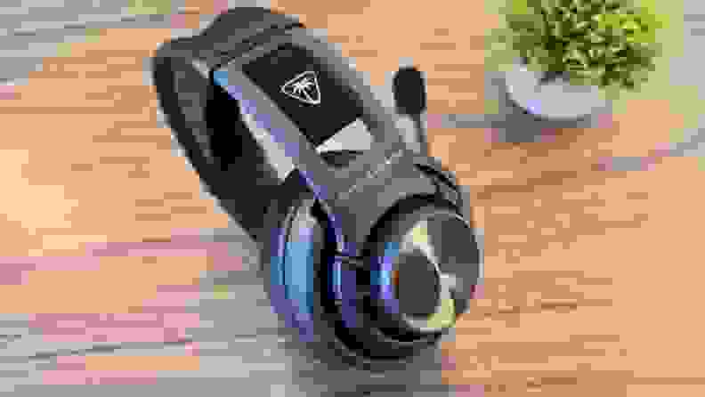 The side of the  Turtle Beach Atlas Air wireless gaming headset with the Turtle Beach palm tree logo.