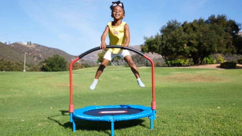 They can get their wiggles out with an easy-to-store trampoline.