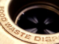 Garbage disposal in sink.