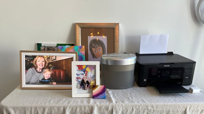 A table set with several photo frames