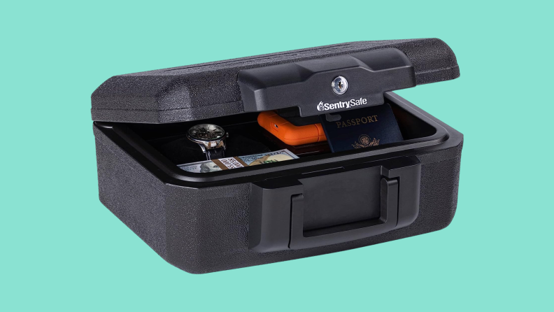 The SentrySafe Fireproof Money Safe on a teal background.