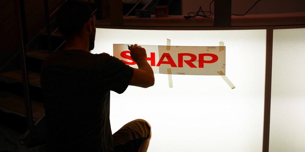 Sharp sets up its booth at IFA 2015