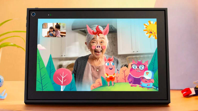 An elderly person plays with animations on a tablet.
