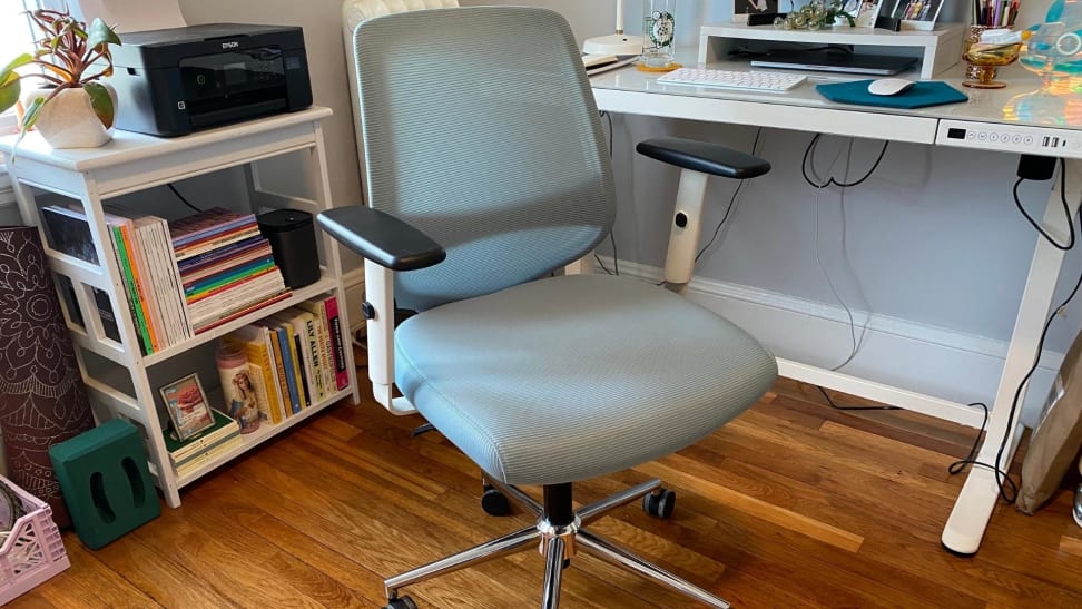 The Branch Daily Office Chair in front of a desk.