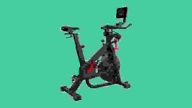 A Bowflex exercise bike against a green background.