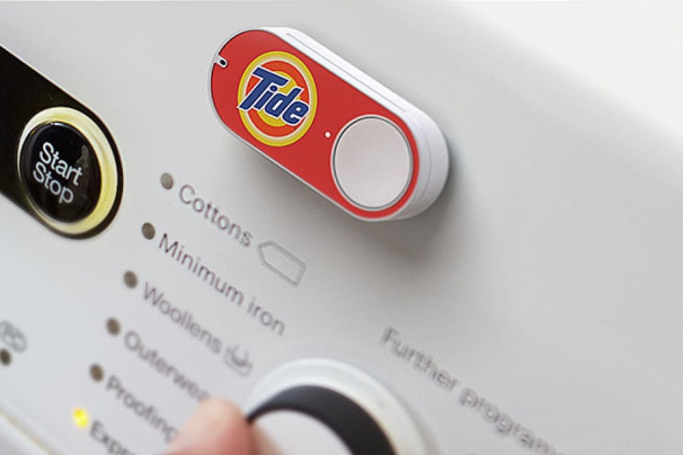 A Tide Dash button stuck to a washer