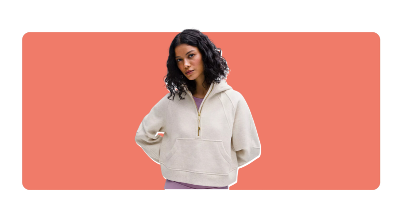 A woman wearing a beige lululemon hoodie