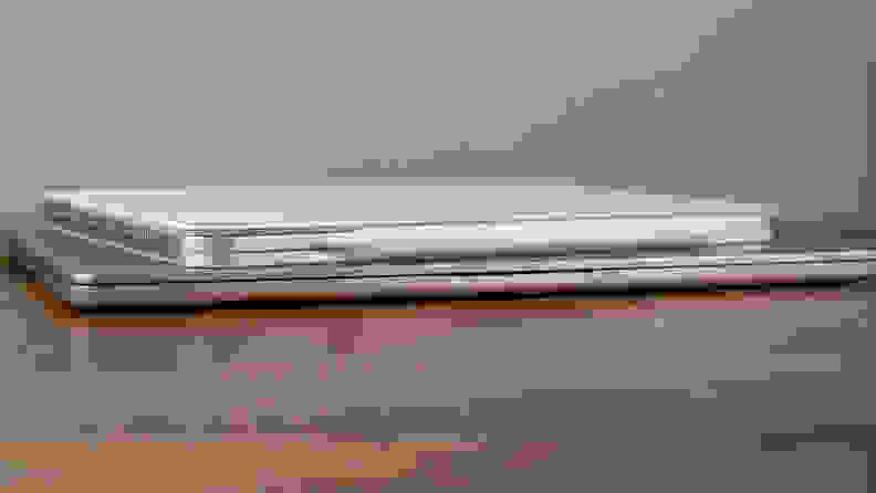 A MacBook Air and an iPad Pro sit on a desk