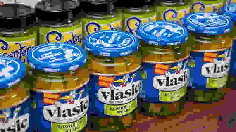 A collection of pickle and salsa jars