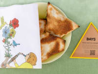 Plate of matza and matza maker