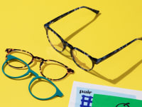 Eyeglasses on yellow background