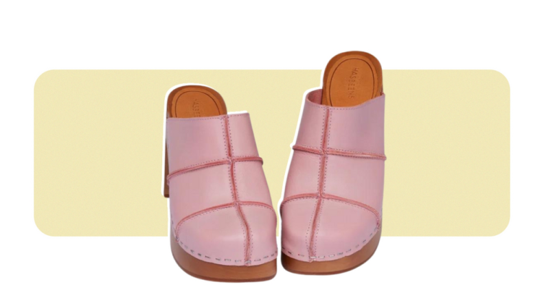 A heeled clog with a pink leather upper featuring stitched panels.