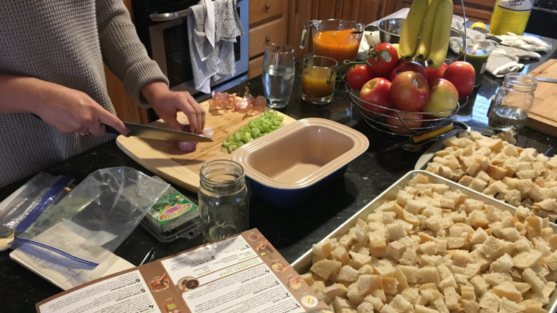 Woman chopping celery and onions for ciabatta stuffing