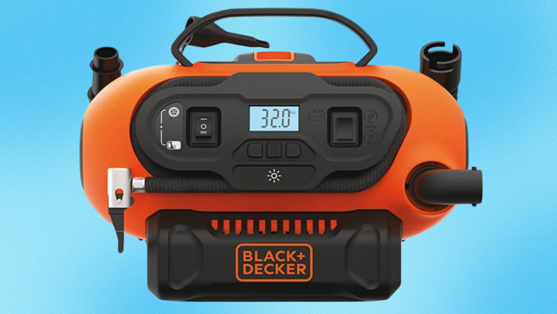 A Black and Decker tire inflator against a blue background