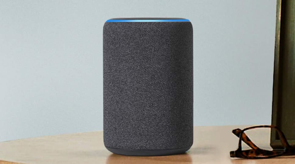 Amazon Echo Plus (second-generation) sitting on desk.