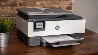 Photo of a white-and-gray HP OfficeJet printer.