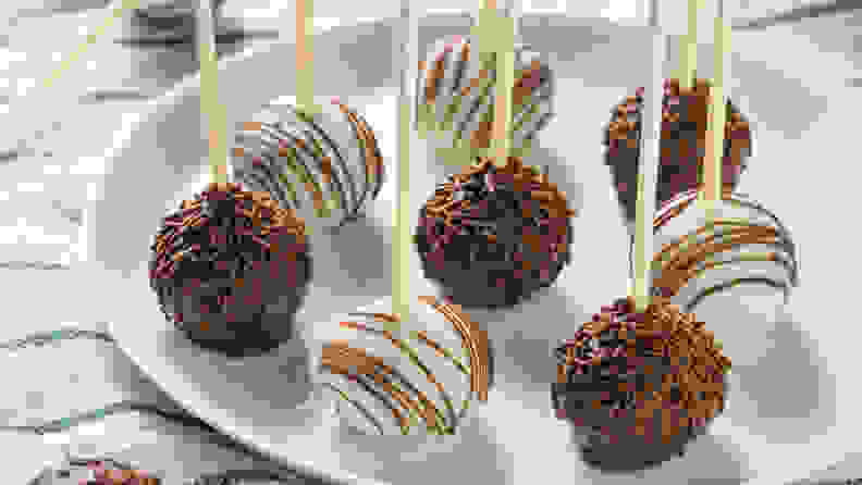 Sweet Homemade Chocolate and Vanilla Cake Pops on a Plate