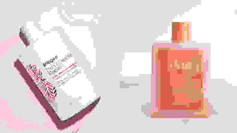 On the left: The Briogeo Don’t Despair, Repair! Super Moisture Shampoo bottle laying diagonally across a pink background with a large clear swatch of the shampoo underneath the bottle. On the right: The coral colored Dae Daily Shampoo standing on a white, cloud-like surface.