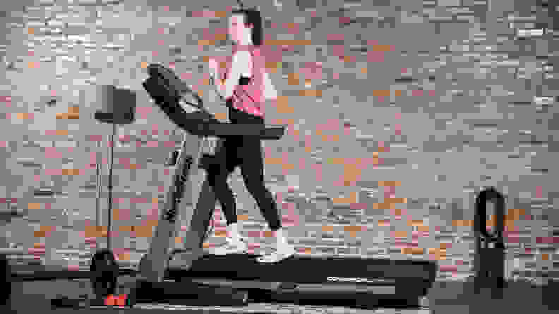 woman running on nordictrack treadmill