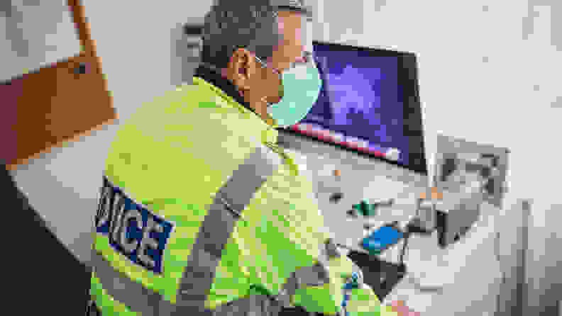 Policeman on computer