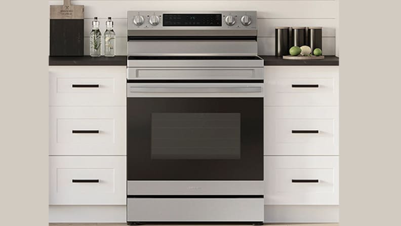 The Samsung NE63A6511ss electric range in a kitchen.