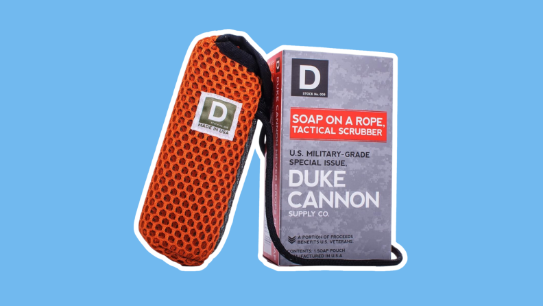 Duke Cannon Supply Co. Tactical Scrubber Soap-on-a-Rope Pouch in the color orange on a blue background.