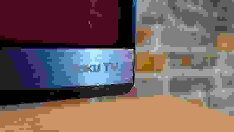 The Roku TV logo, as seen on the bottom of the TCL 6-Series panel