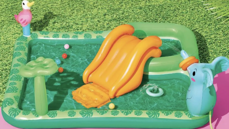 A safari kiddie pool and slide