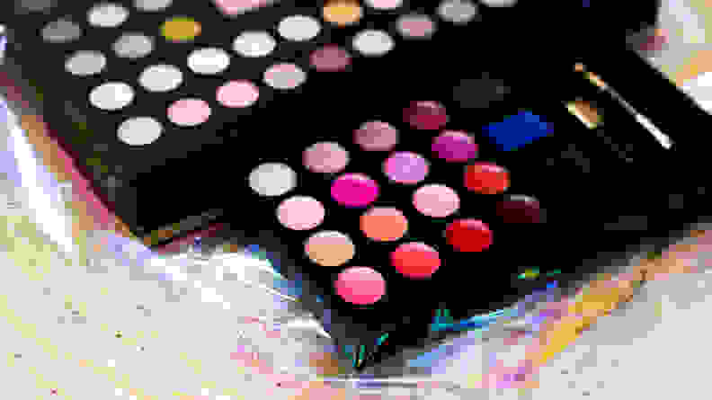 A closeup on the lip glosses in a makeup palette.