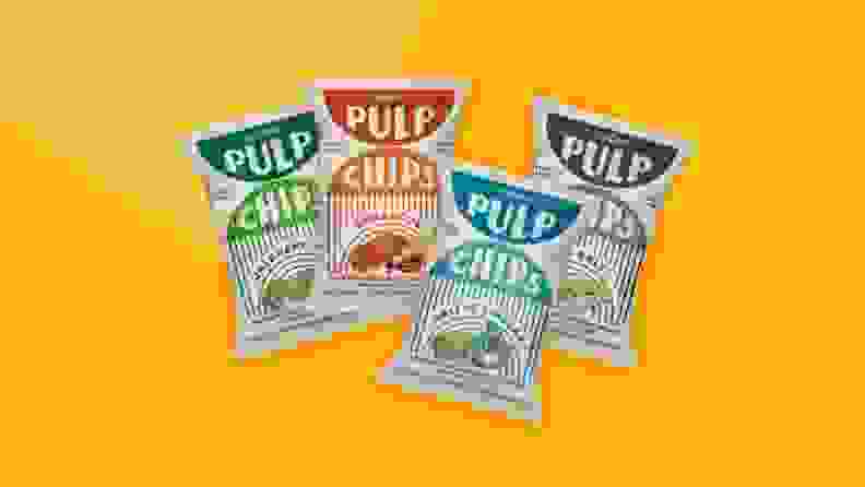 Four bags of Pulp Pantry chips against a yellow background.