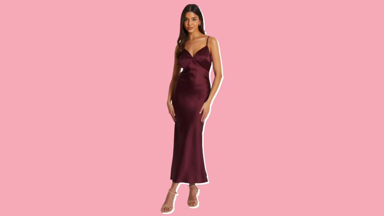 Photo of a woman wearing the burgundy-colored Women's Satin V-Neck Slip Maxi Dress.