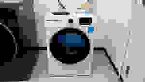 A white ventless dryer sits next to a larger dryer in the Reviewed lab.