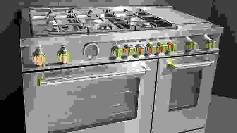 Stainless steel Bertazzoni range with gold hardware
