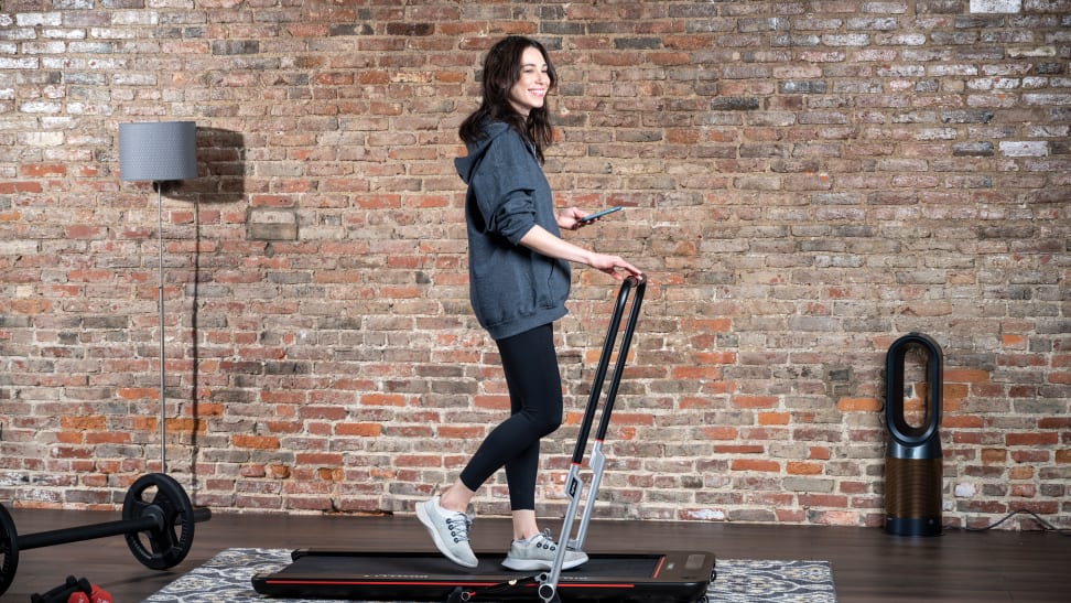 woman walking on treadly treadmill