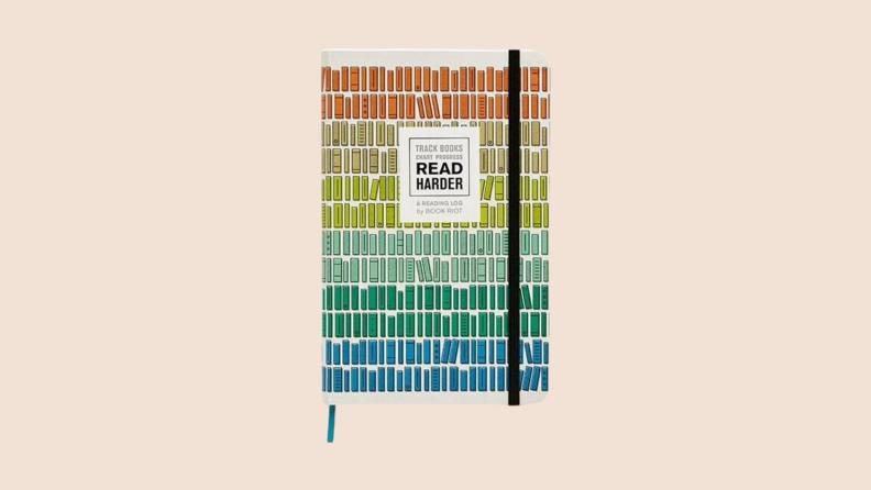 The front cover of the Reading Log from Book Riot, featuring an illustration of shelves of books in a rainbow effect color scheme.
