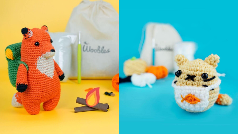 Left: A crocheted fox with a backpack and a campfire; right: a crocheted cat wearing a fish bib
