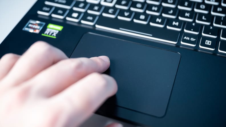 person uses the trackpad