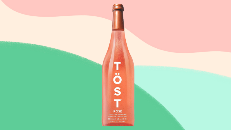 Bottle of pink colored wine.