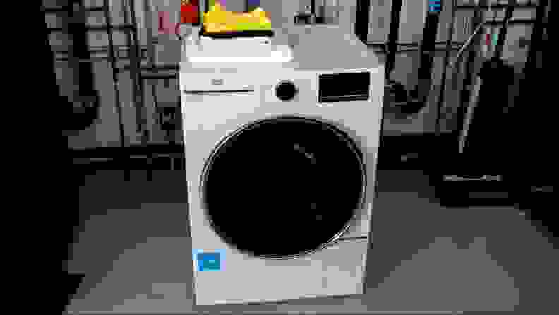 The white, small washing machine sits in the Reviewed Labs.