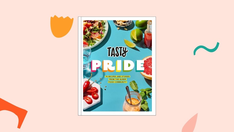 The Tasty Pride cookbook against a light pink background.